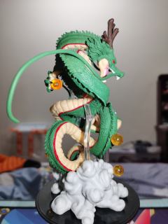 造型、模型精细度都很强，还是有点小瑕疵，7颗龙珠内有气泡，涂