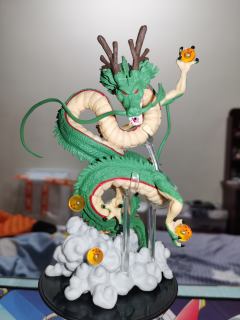 造型、模型精细度都很强，还是有点小瑕疵，7颗龙珠内有气泡，涂