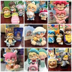 拆开第N个Dudoo盲盒时,纸盒摩擦的沙沙声像极了星星落进玻