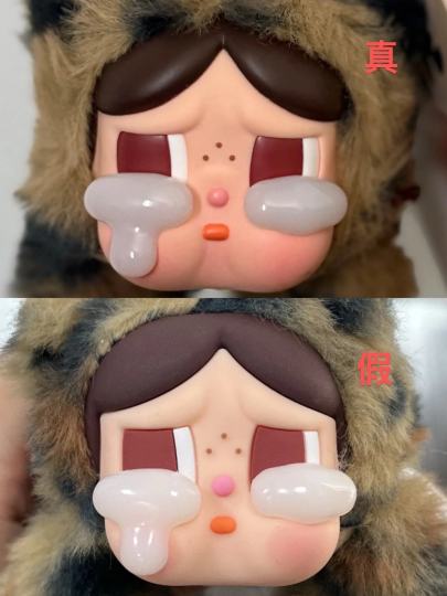 鉴别方法：
1、假货头发颜色浅，哑光漆感粗糙，正品是有油性哑光色，头发颜色深；
2、假货脸白，腮红和肤色色差感强，腮红呈块状不融合，腮红边界痕迹明显；
3、假货眼缝隙大，眼睛漆感粗糙，嘴巴鼻子粗糙，眼