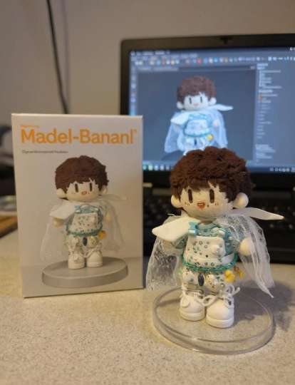 听说这个周可可手办很火？咱们周可可也有。感觉这个挺有趣的，试着生成了一个周可可穿泡泡娃衣的手办。生米们看一下感觉好看吗？