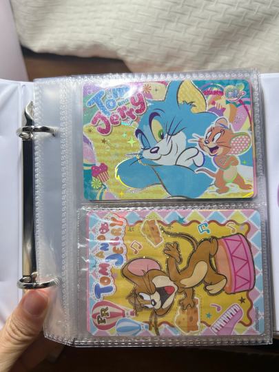 我找到了一本很适合装猫和老鼠的卡册！！